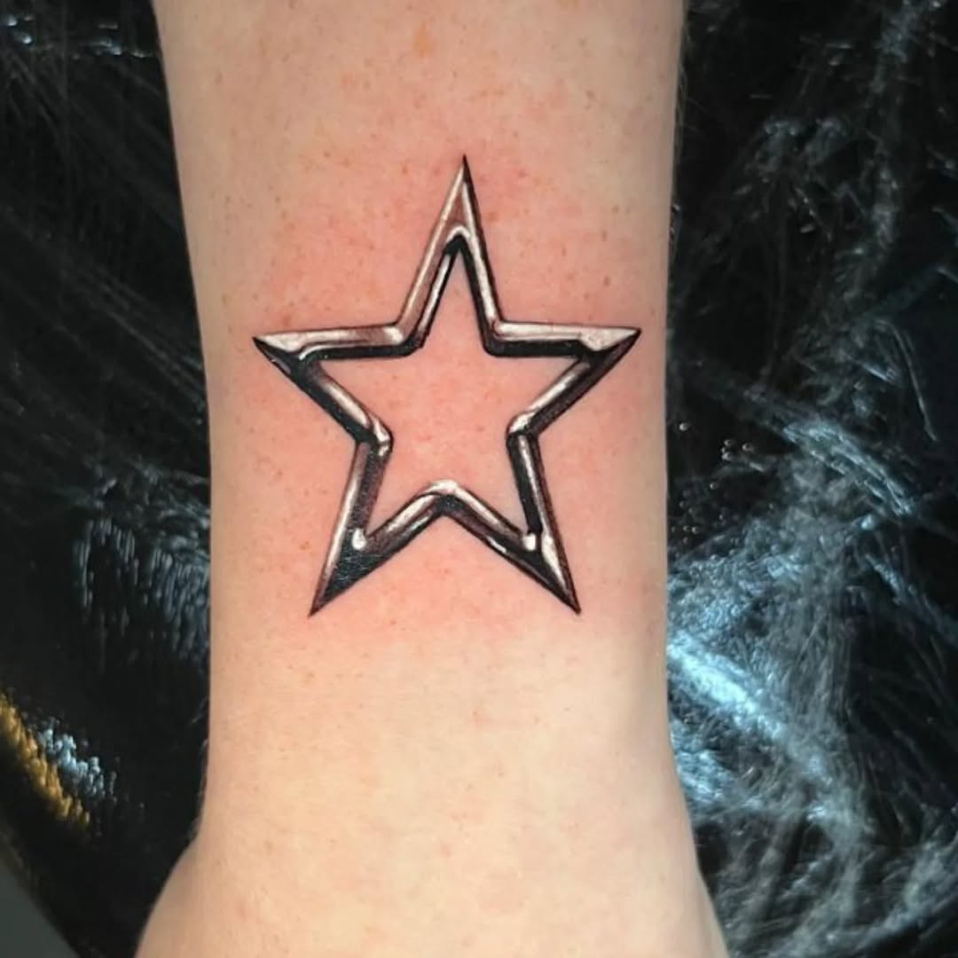 Stylish Silver Star Ink Tattoo Design Tattoo on skin