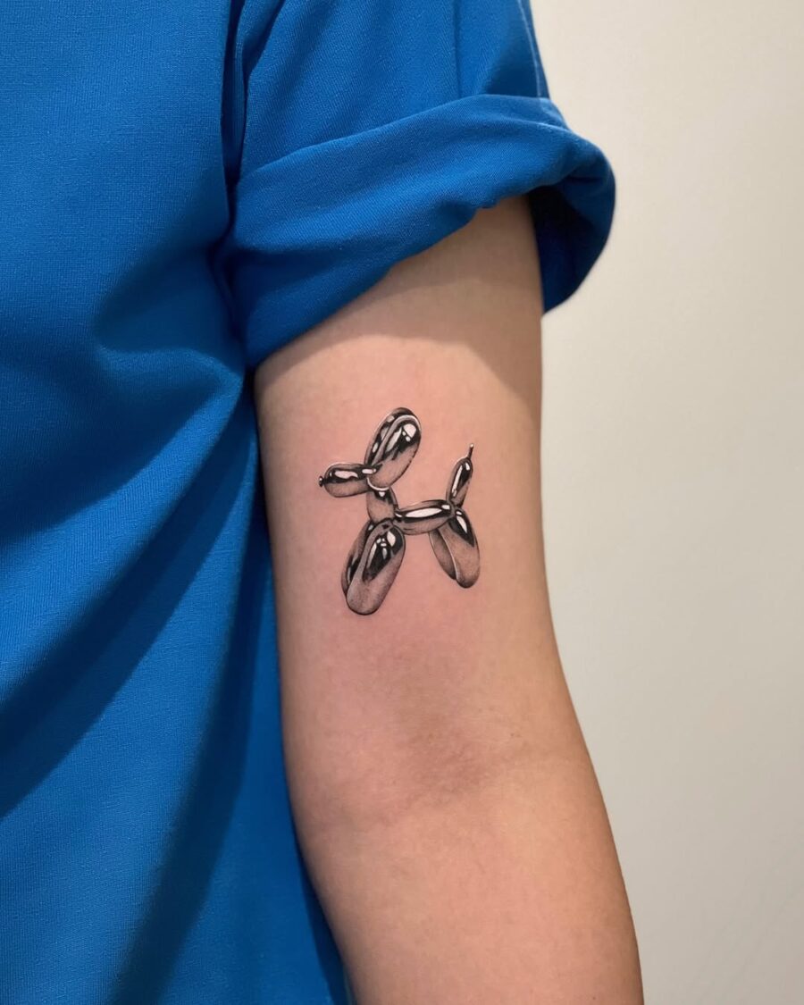 Unique silver ink balloon tattoo on arm Tattoo on skin