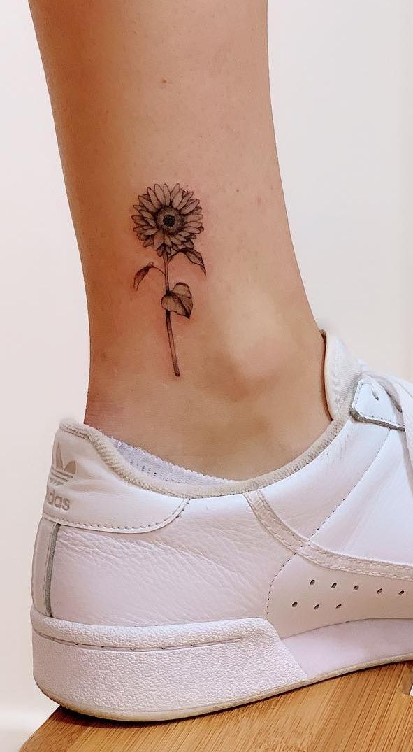 Realistic Small Simple Sunflower Tattoo Tattoo on skin