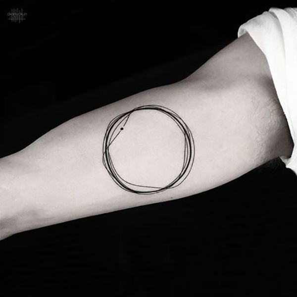 Simple Circles Lines with a Point Tattoo Tattoo on skin