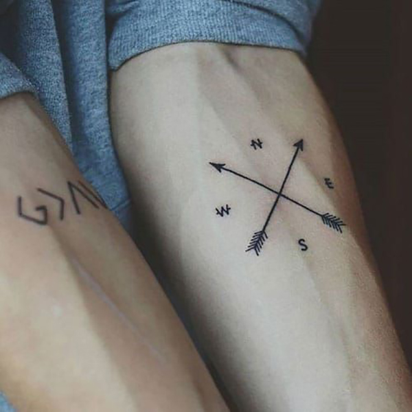 Simple Compass Directions with Arrows Tattoo Tattoo on skin