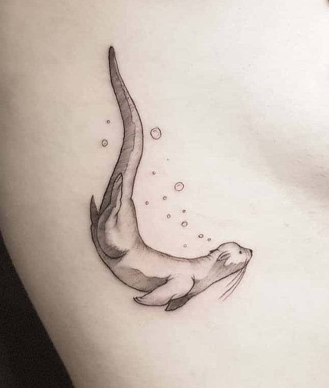 Simple Cute Otter Diving Tattoo Tattoo on skin