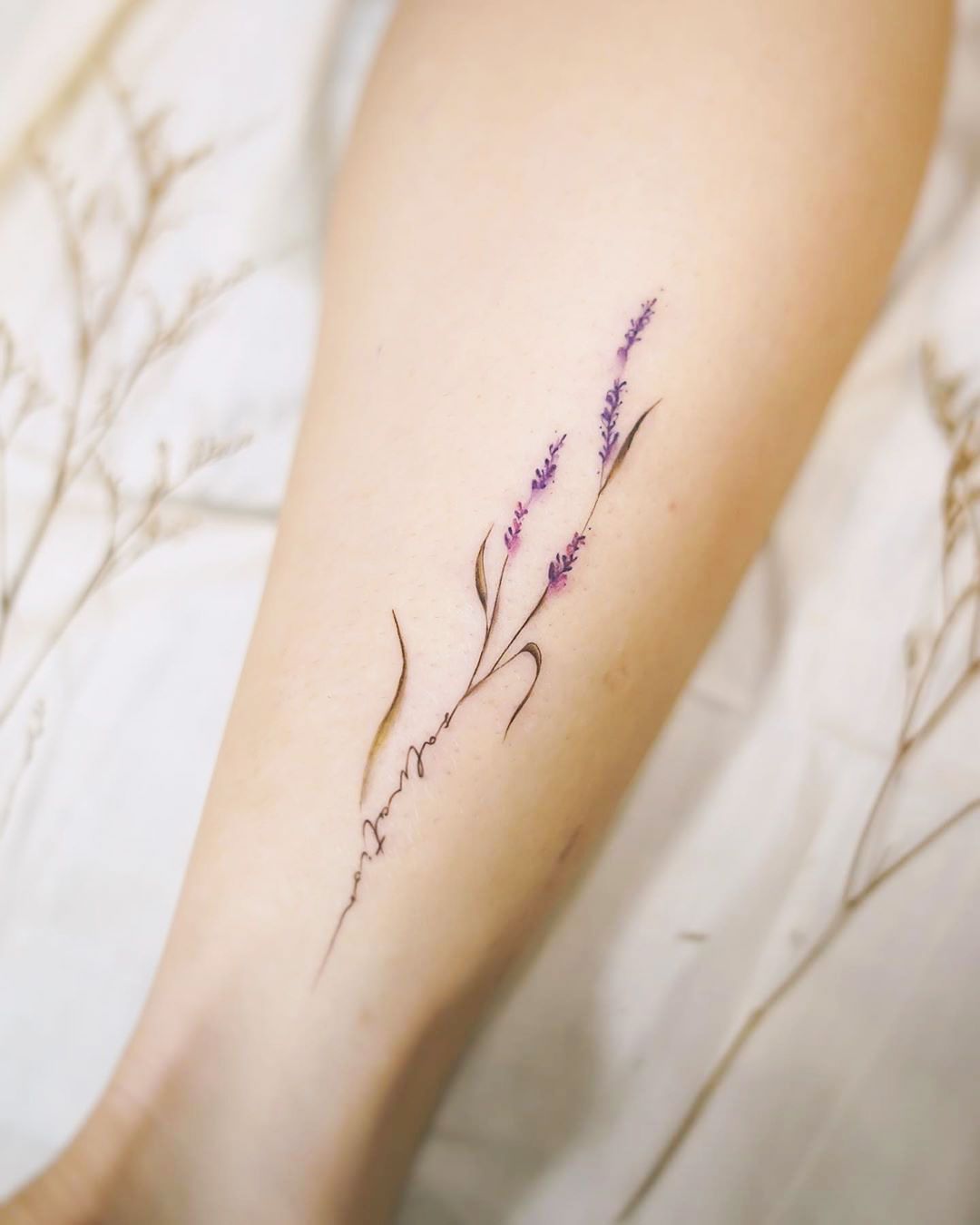 Simple Lavender “Salvation” Text Tattoo Tattoo on skin