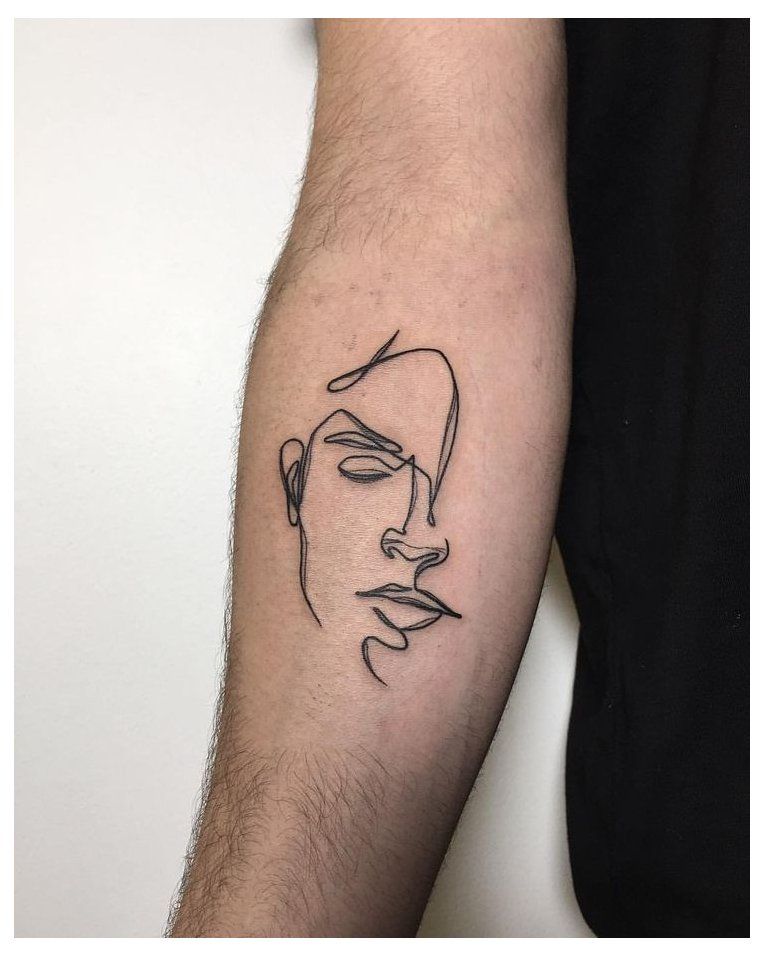 Simple Line Work Creating a Face Tattoo Tattoo on skin