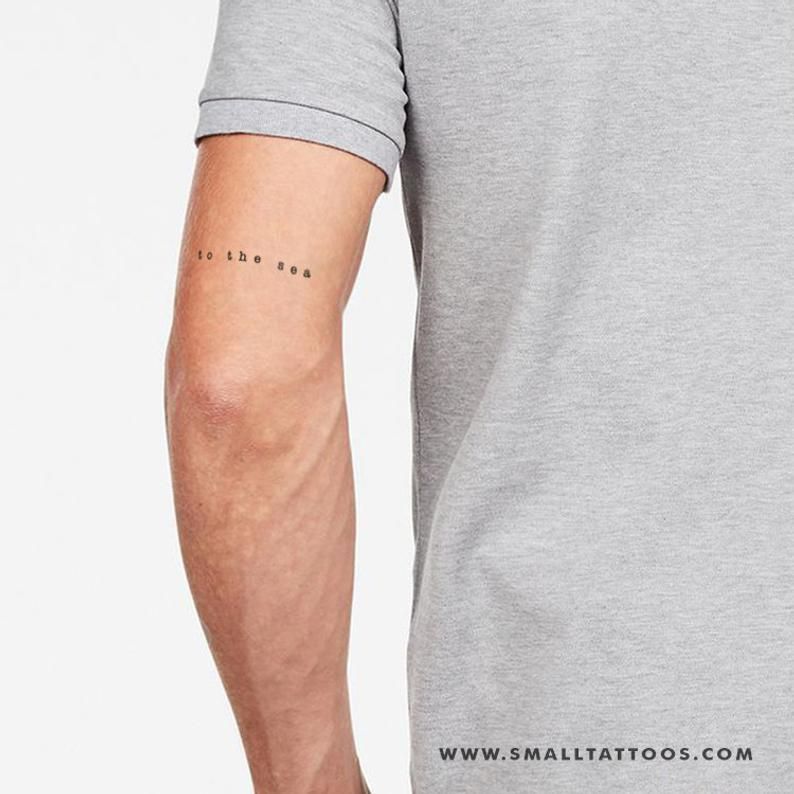 Simple “To the Sea” Text Tattoo Tattoo on skin