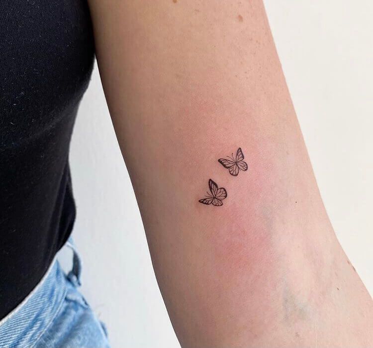 Two Tiny Butterflies Tattoo Tattoo on skin