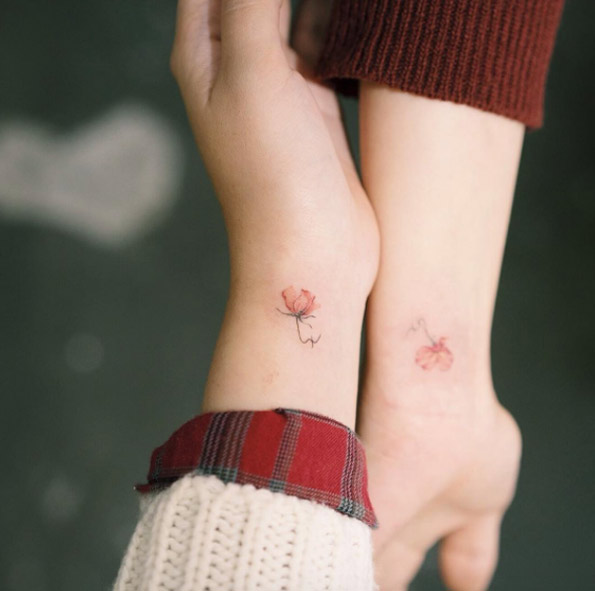 Small Flower Wrist Tattoo Design Tattoo on skin