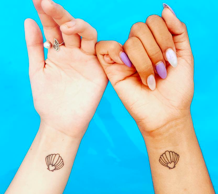 Small Seashell Heart Tattoo Design Tattoo on skin