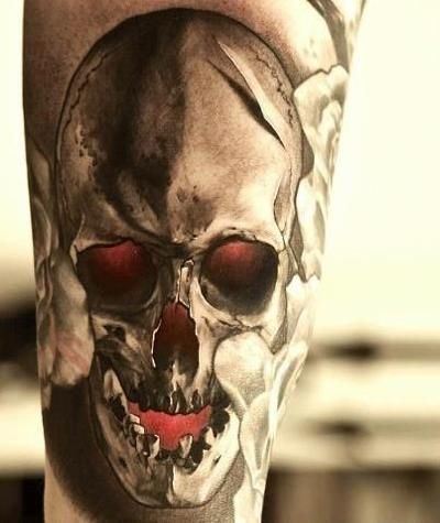Cool human skull tattoo on a guy’s upper arm Tattoo on skin