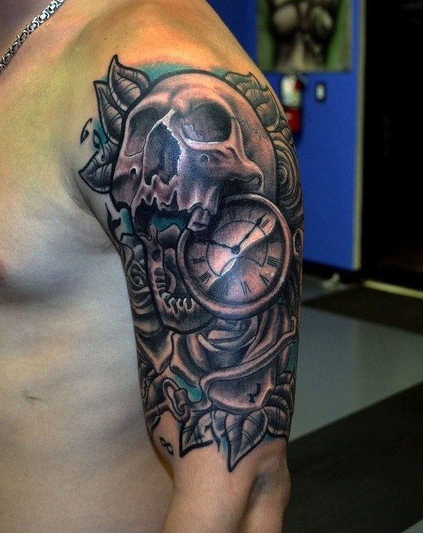 Steampunk styled, detailed skull tattoo on arm Tattoo on skin