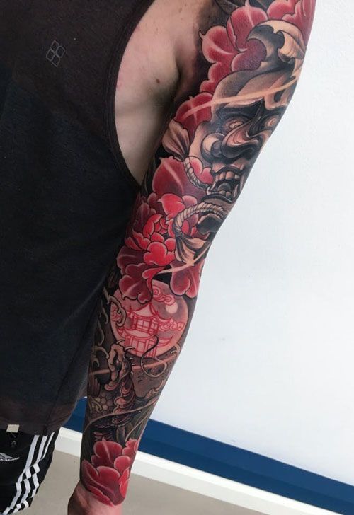 Asian Inspired Windswept Monster Mask Sleeve Tattoo Tattoo on skin