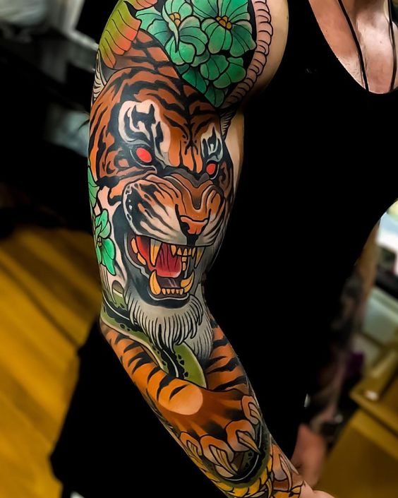 Colorful Botanical Tiger and Snake Scene Sleeve Tattoo Tattoo on skin