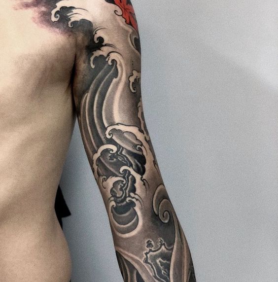 Gray Waves with Red Leaf Accent Sleeve Tattoo Ideas Tattoo on skin