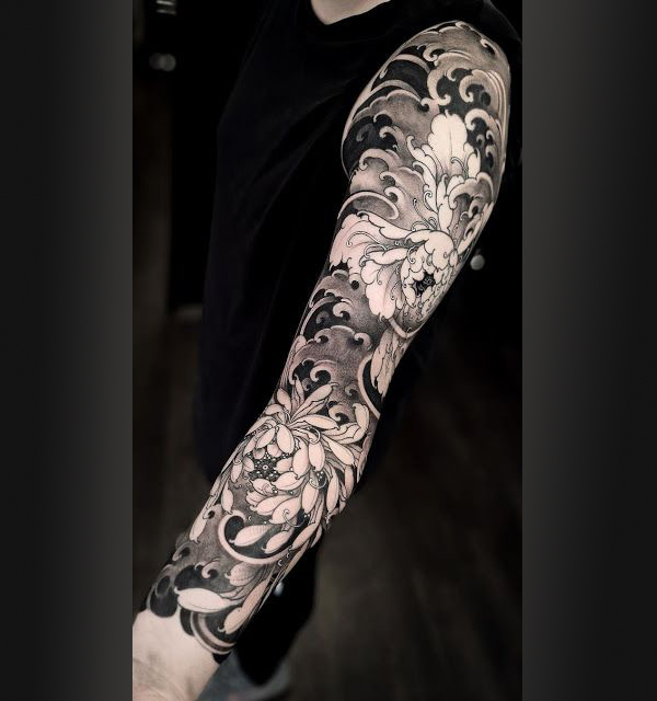Greyscale Flowers and Windswept Waves Sleeve Tattoo Ideas Tattoo on skin