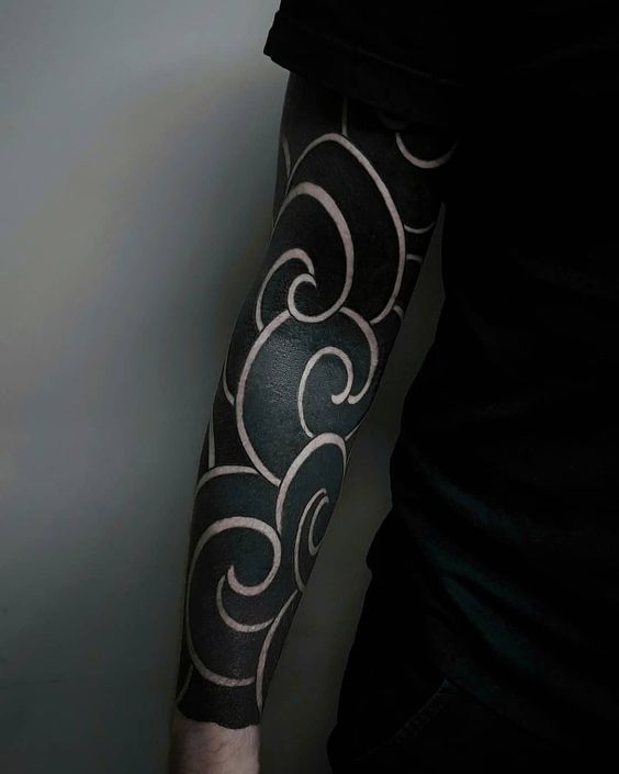 Minimalist Black and White Swirls Sleeve Tattoo Tattoo on skin