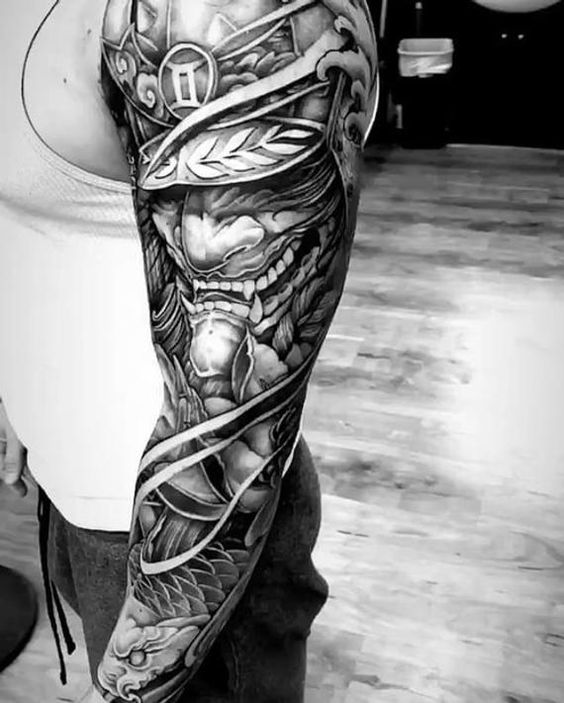 Pointy-Faced Man with Helmet and Thematic Framing Dragon Sleeve Tattoo Ideas Tattoo on skin