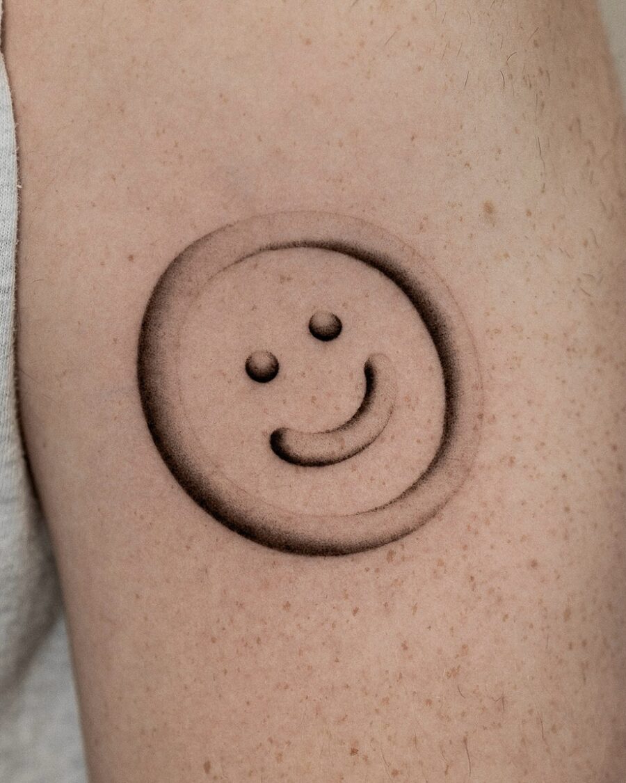 Charming minimalist smiley face tattoo Tattoo on skin