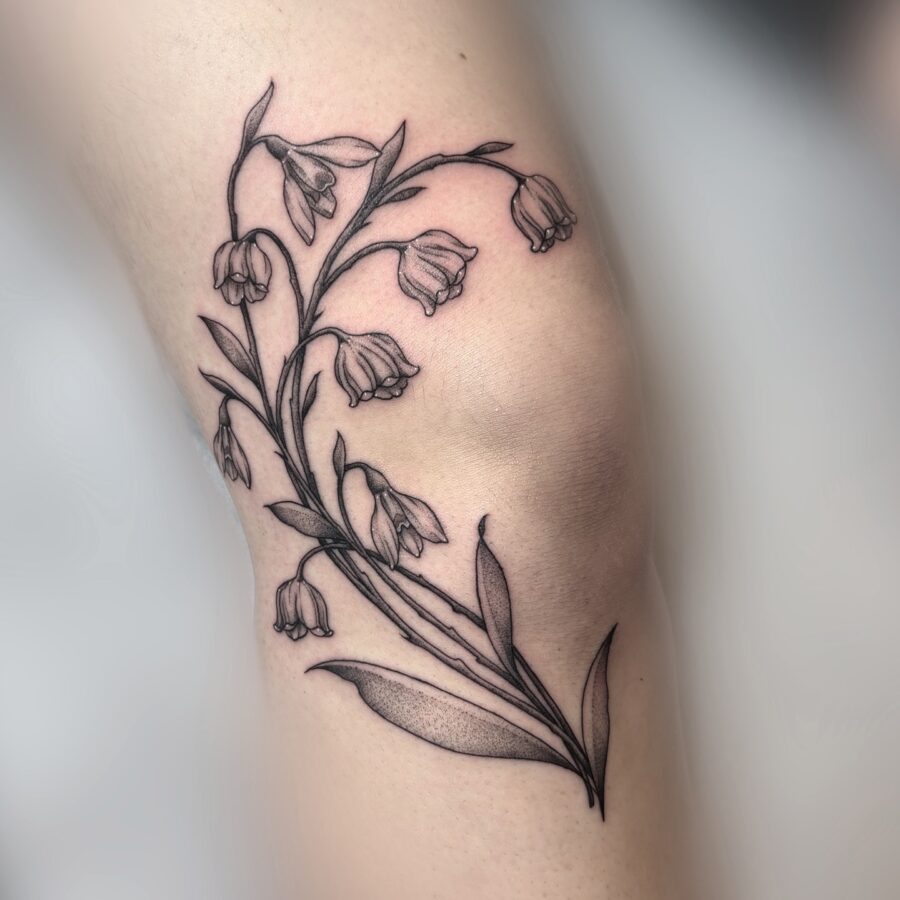 Elegant snowdrop tattoo with intricate details Tattoo on skin