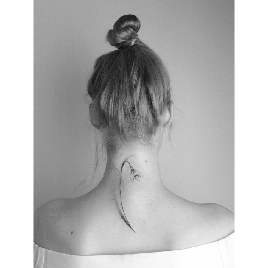 Sleek snowdrop tattoo, subtly stylish vibe Tattoo on skin