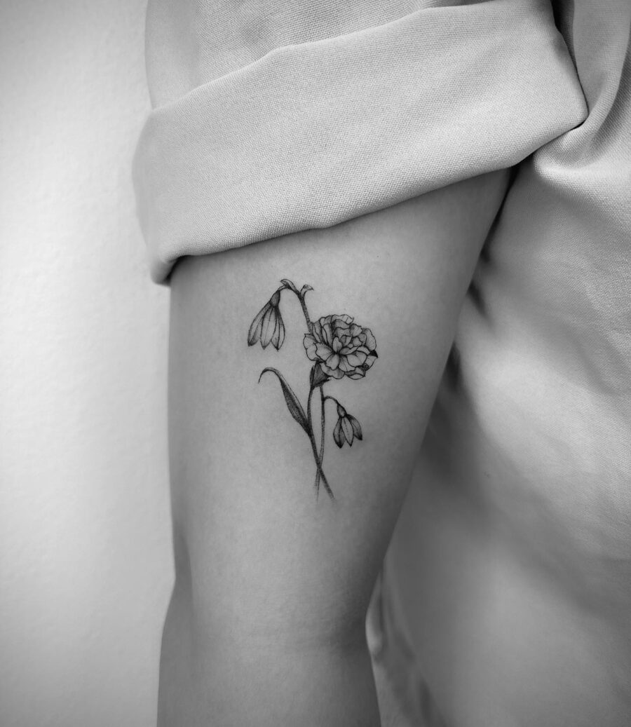 Stunning snowdrop flower tattoo on the arm Tattoo on skin