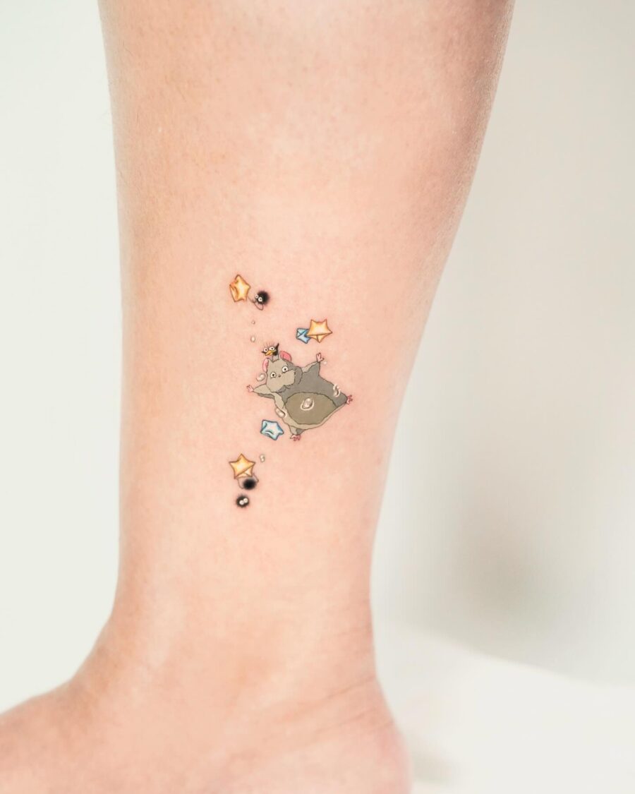 Charming tattoo of Spirited Away's mouse character Tattoo on skin