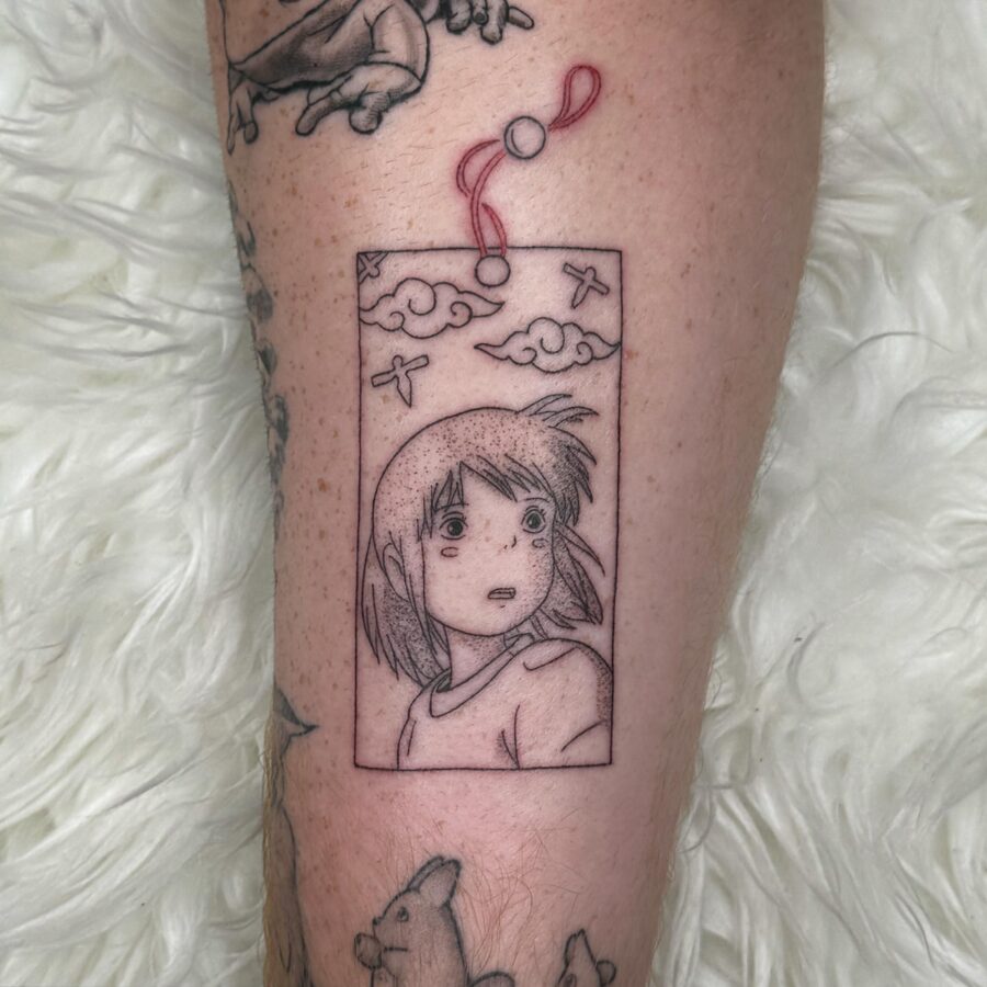 Intricate tattoo of Chihiro from Spirited Away Tattoo on skin