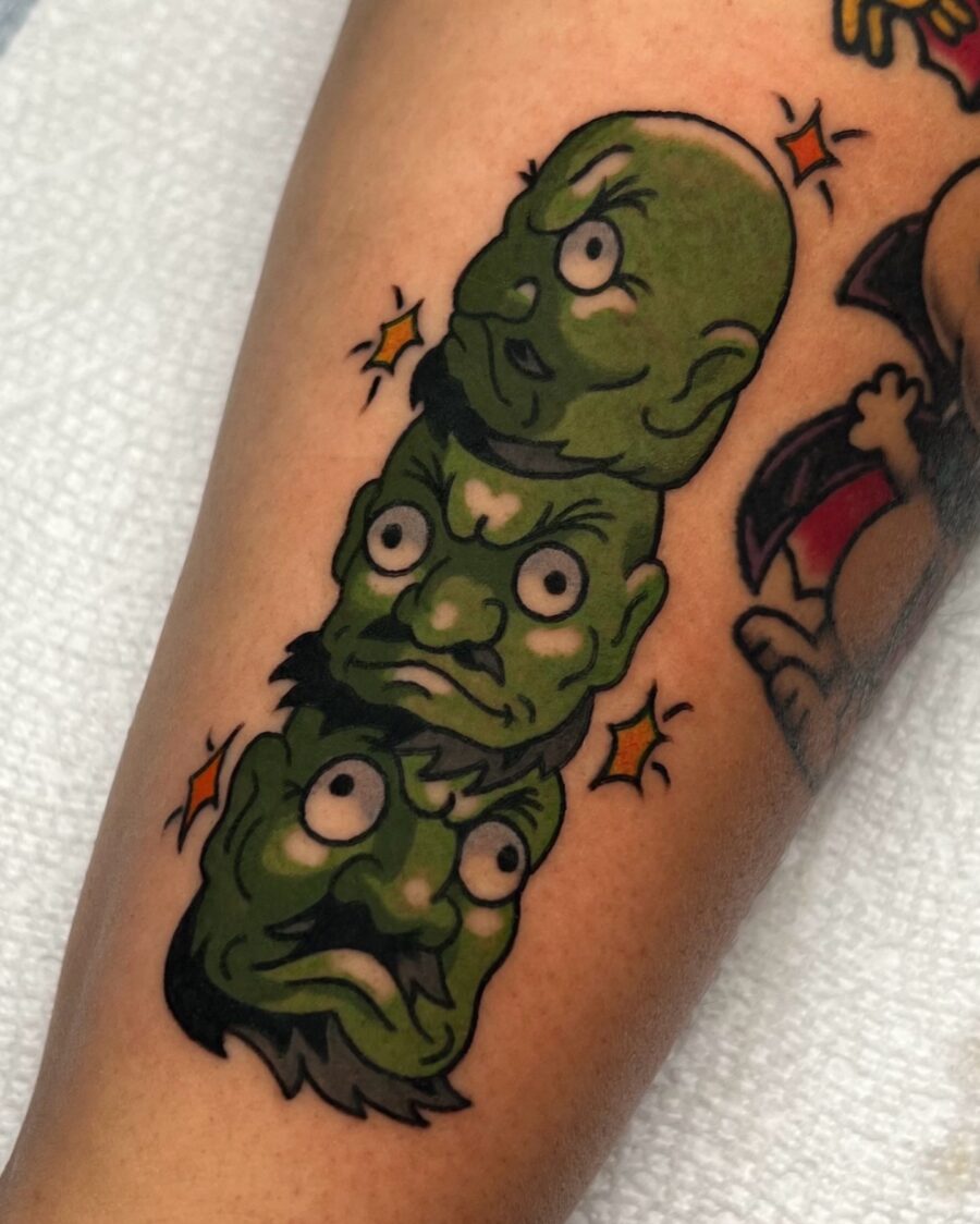 Unique depiction of green faces from Spirited Away Tattoo on skin