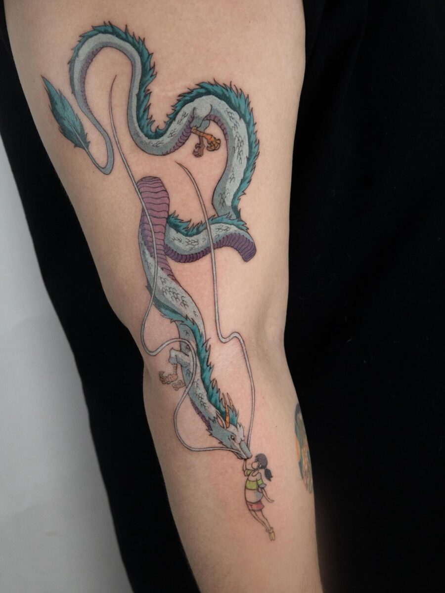 Vibrant Spirited Away Dragon Tattoo Design Tattoo on skin
