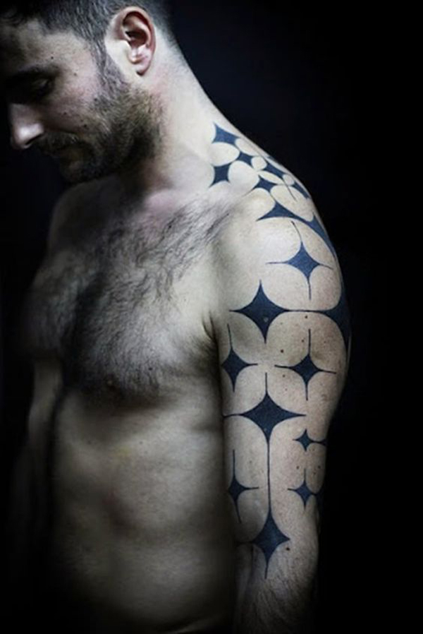 Four Pointed Black Star Tattoo on Sleeve Tattoo on skin