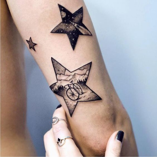 Star Tattoo with Scenes Inside Tattoo on skin