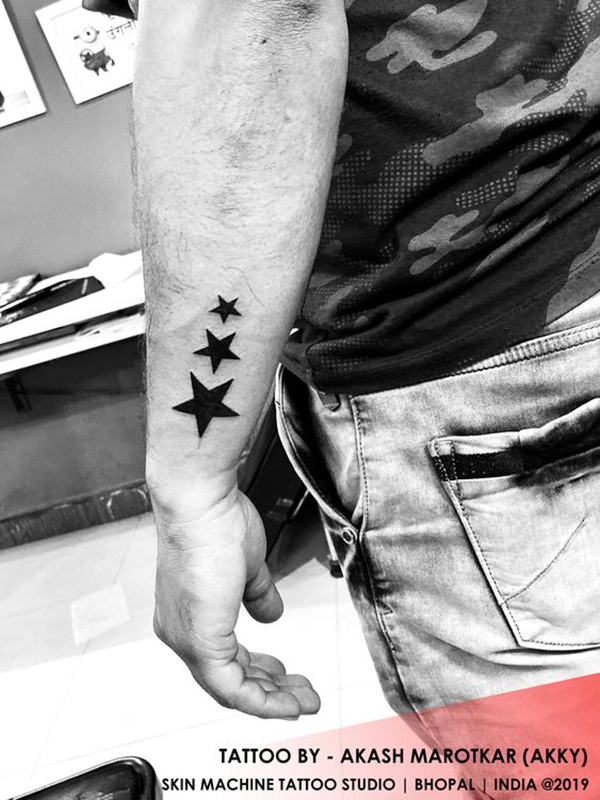 Star Tattoos on Forearm Tattoo on skin