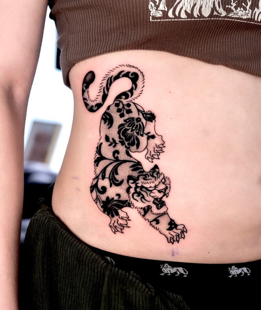 Bold tiger tattoos showcasing intricate designs Tattoo on skin