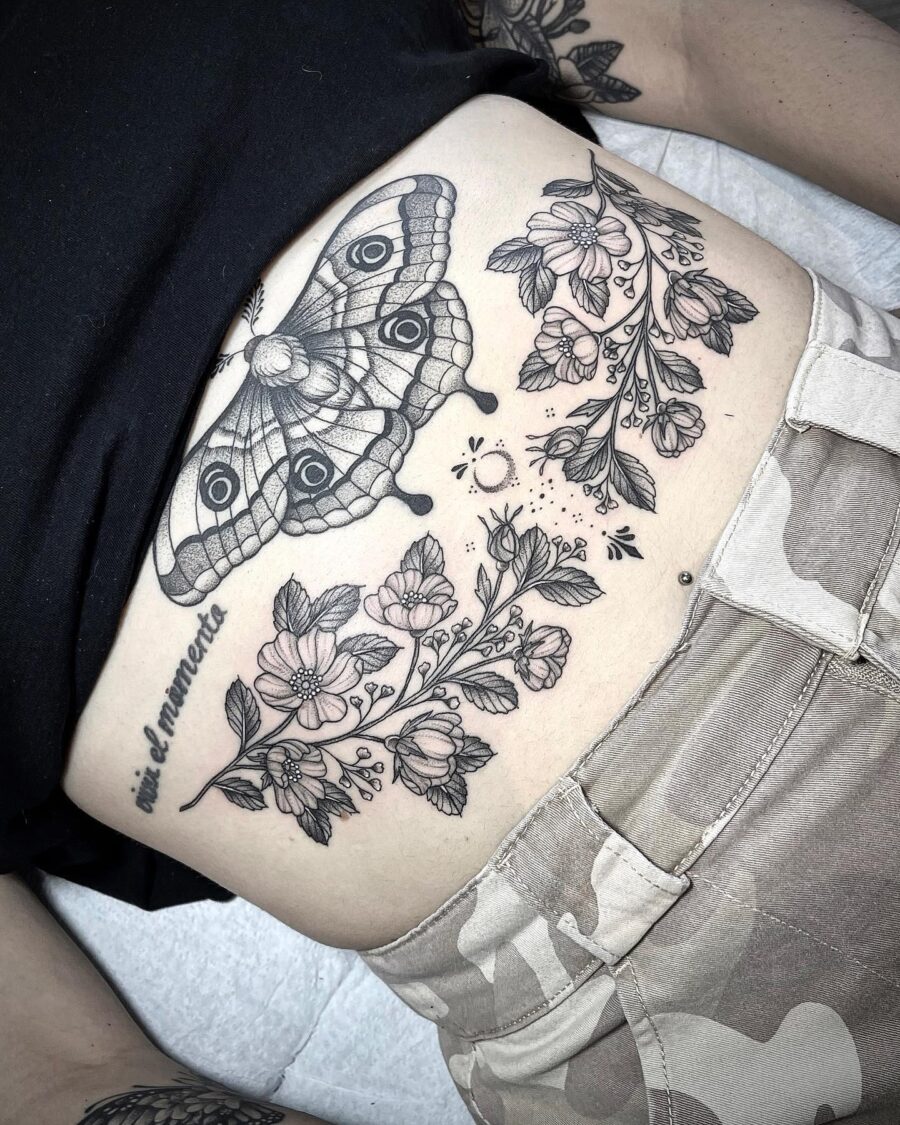 Intricate Moth and Floral Stomach Tattoo Tattoo on skin