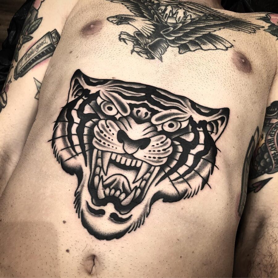 Striking tiger tattoo makes a fierce statement Tattoo on skin