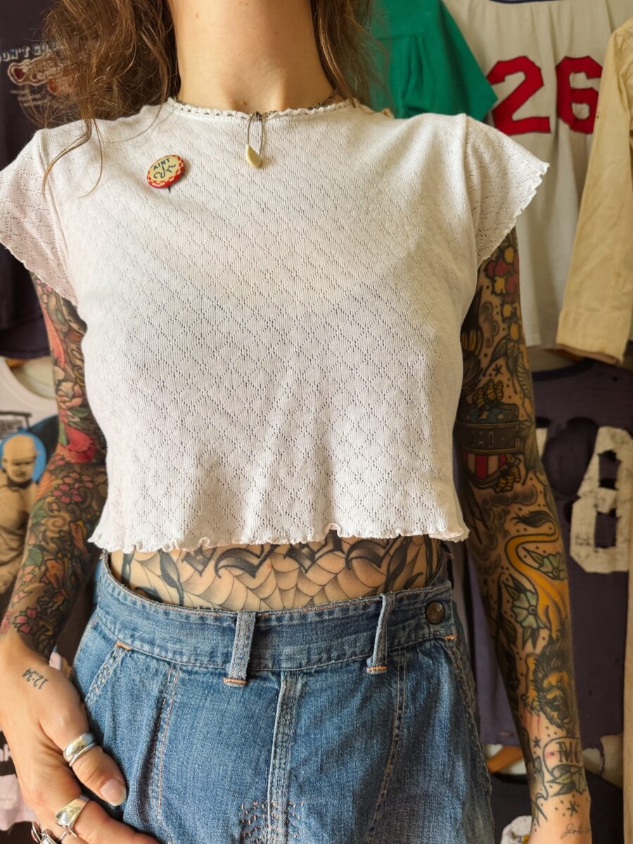 Unique stomach tattoo showcasing artistry and fashion Tattoo on skin