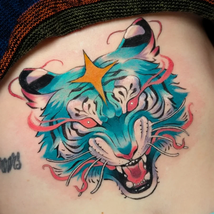 Vibrant Tiger Tattoo with Unique Color Palette Tattoo on skin