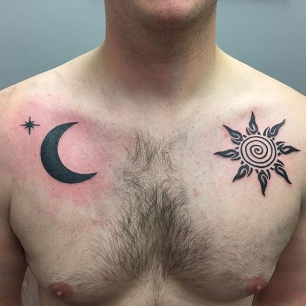 Bold Chest Design with a Sun and Moon for Each Side Tattoo on skin
