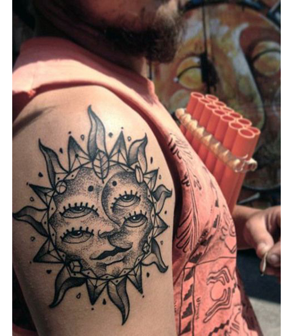 Four-Eyed Sun Keeps a Watchful Stare Tattoo on skin