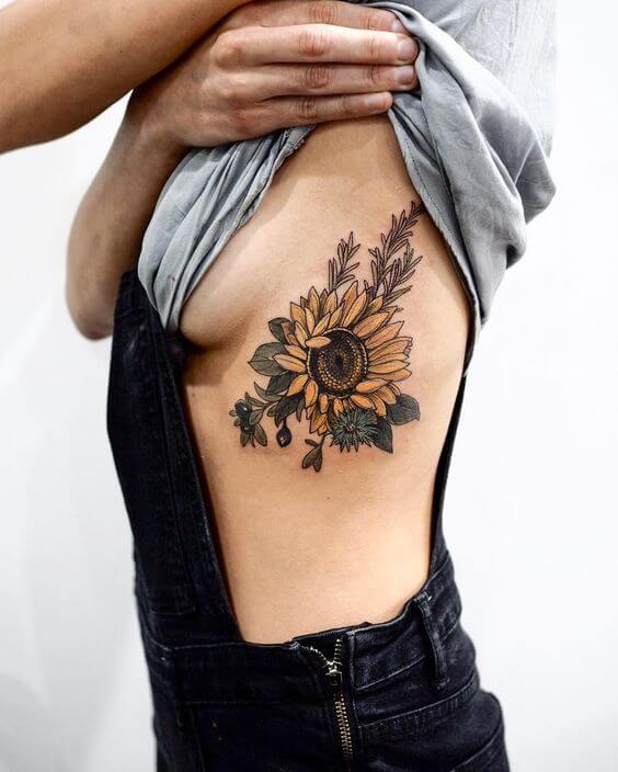 Exotic Floral Cluster with Sunflower Tattoo Tattoo on skin