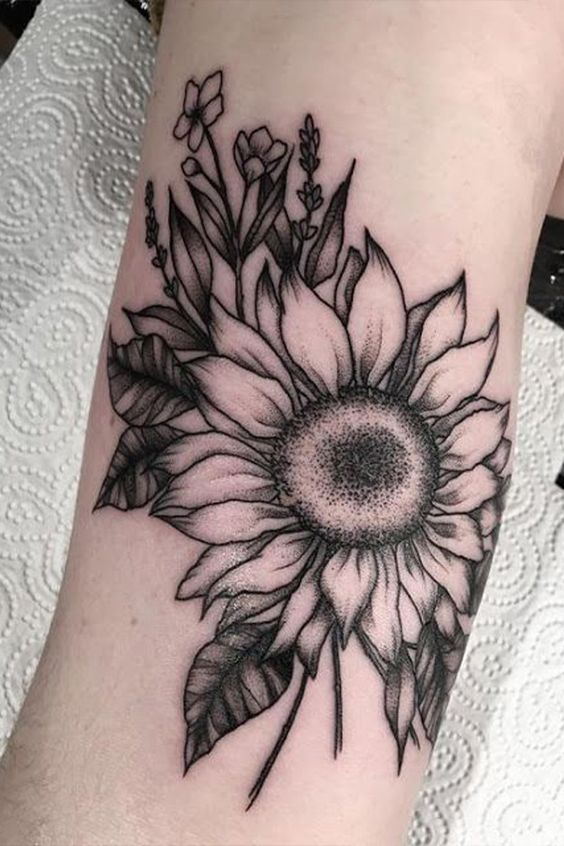 Finely Detailed Sunflower Tattoo Tattoo on skin