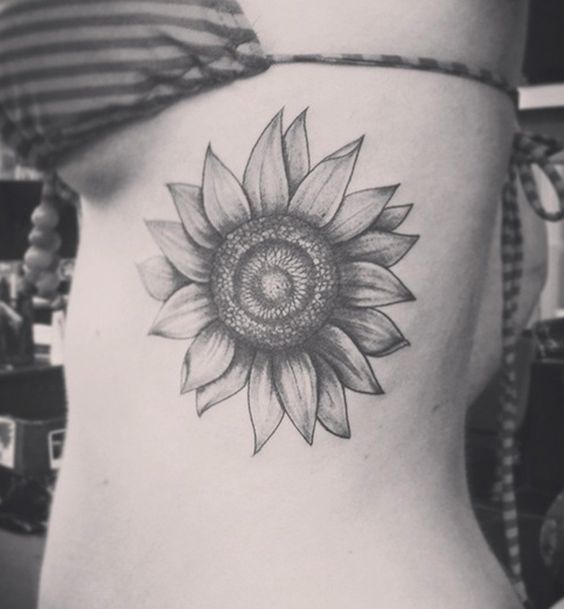 Gorgeous Black and Grey Sunflower Tattoo Tattoo on skin