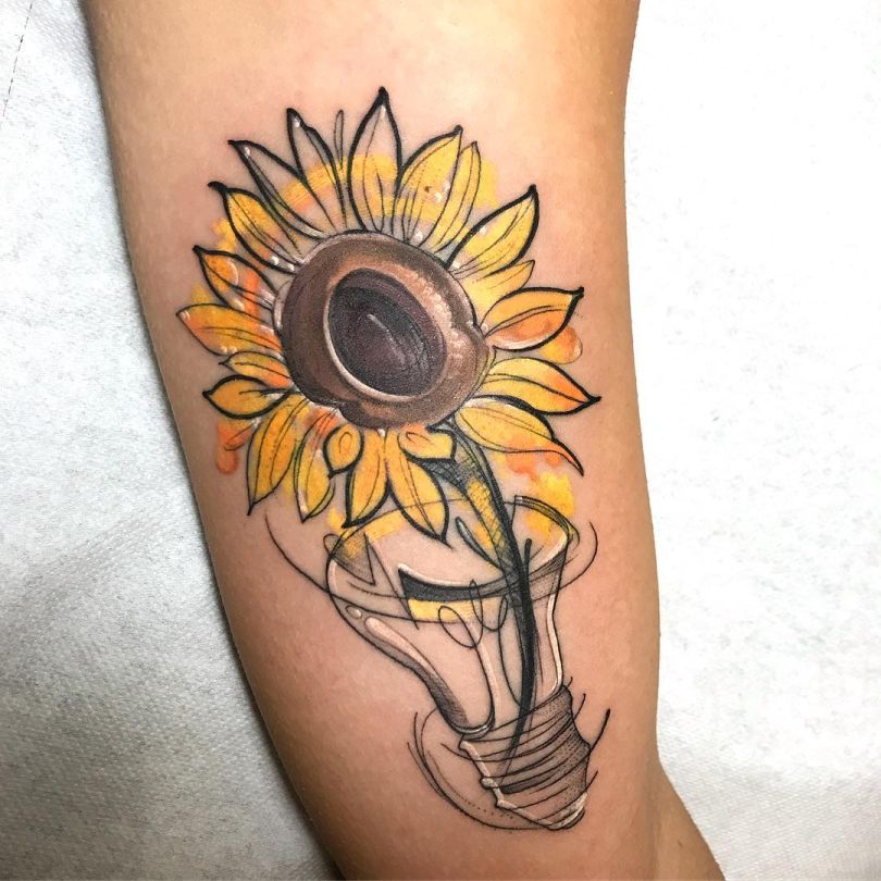 Whimsical Sunflower and Light Bulb Sketch Tattoo Tattoo on skin