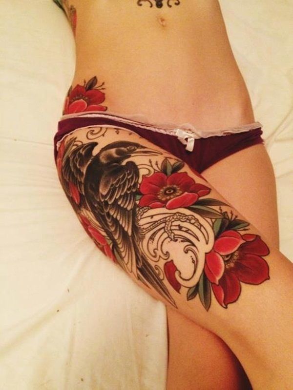 A beautiful birds and flowers tattoo on the thighs Tattoo on skin