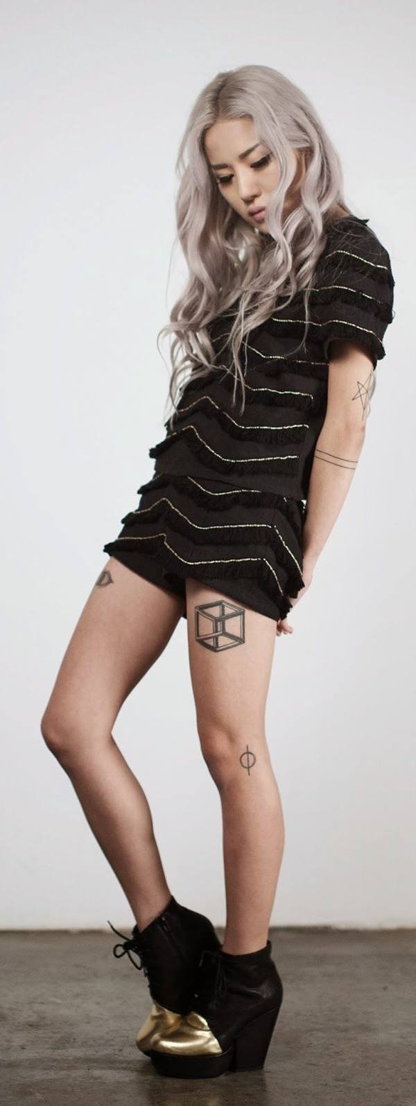 A cool square tattoo on the thighs Tattoo on skin