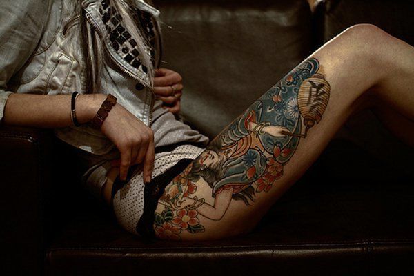 A Great magic tattoo on the leg thigh tattoo Tattoo on skin