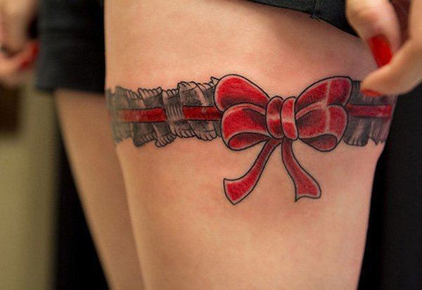 A love band tattoo thigh tattoo Tattoo on skin