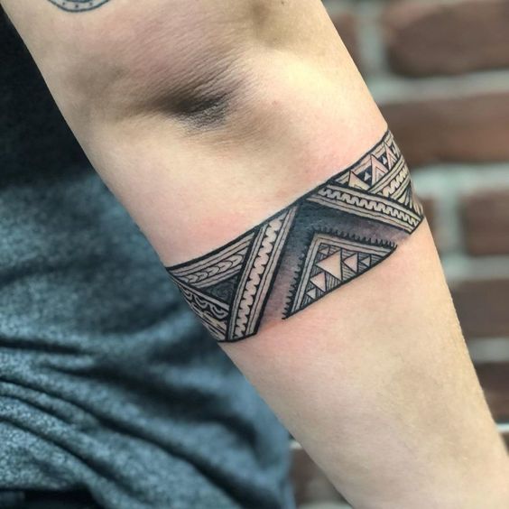 Armband With Various Triangle Motifs Tiki Tattoo Tattoo on skin
