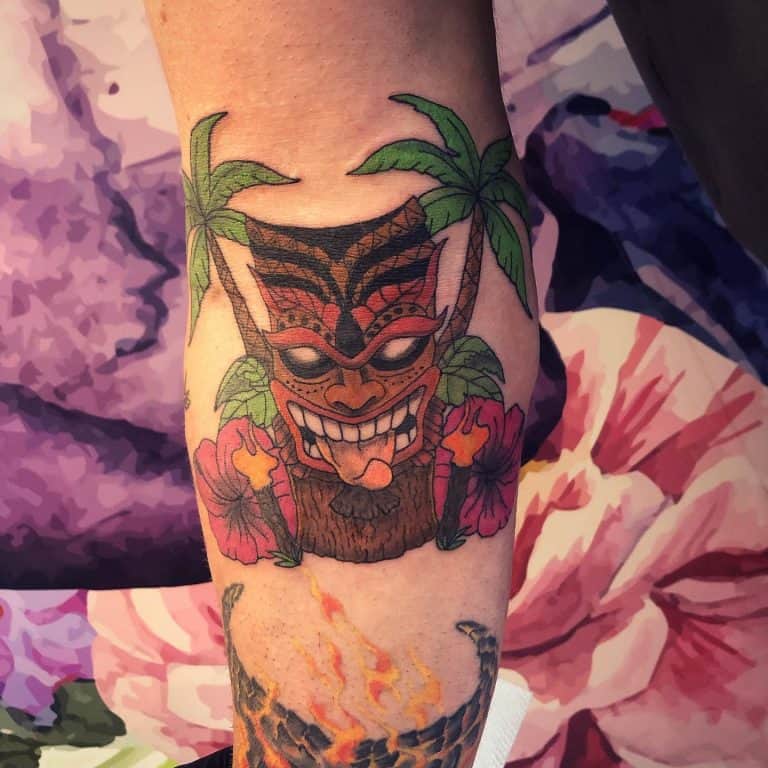 Colorful Tiki with Tongue Sticking Out Tiki Tattoos Tattoo on skin