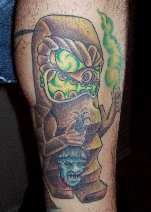 Menacing Tiki in Contemporary Style Tiki Tattoo Tattoo on skin