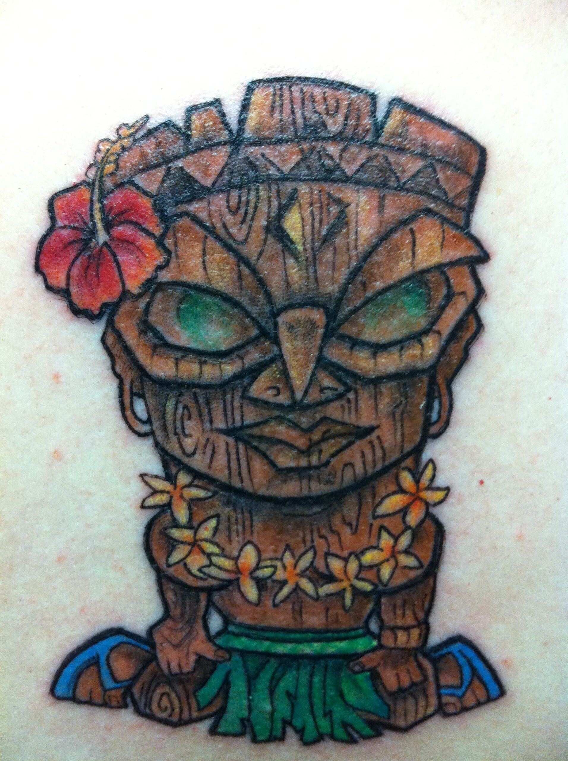Resting Child-like Tiki Statue Tiki Tattoos Tattoo on skin